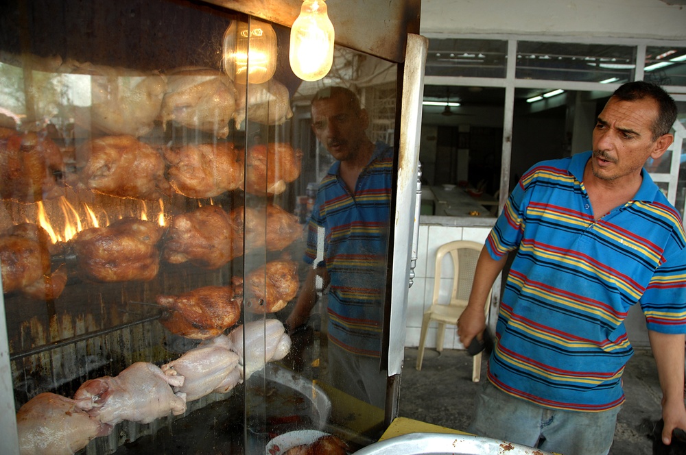 Iraqi National Police Monitor Traffic Checkpoint