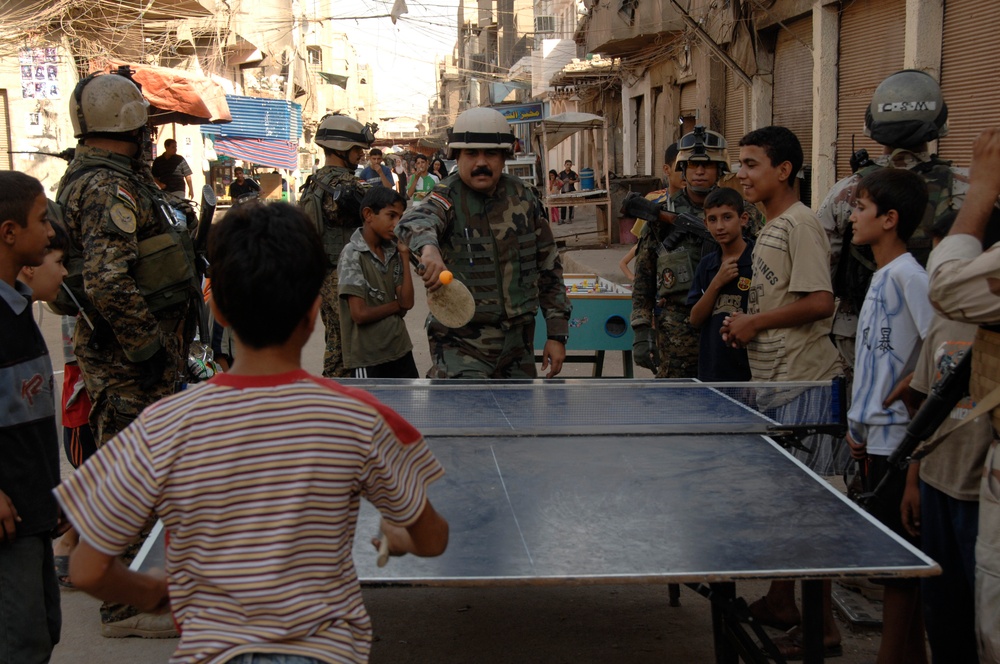 U.S. Soldiers and Iraqi Police Conduct Joint Patrol