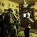 Iraqi and U.S. Soldiers Search for Weapon Cache