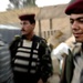 U.S. and Iraqi Soldiers Search Car Lot