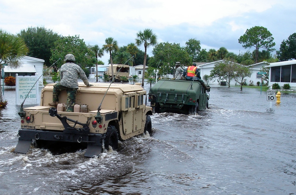 National Guardsmen Evacuate Florida Residents in Wake of Fay