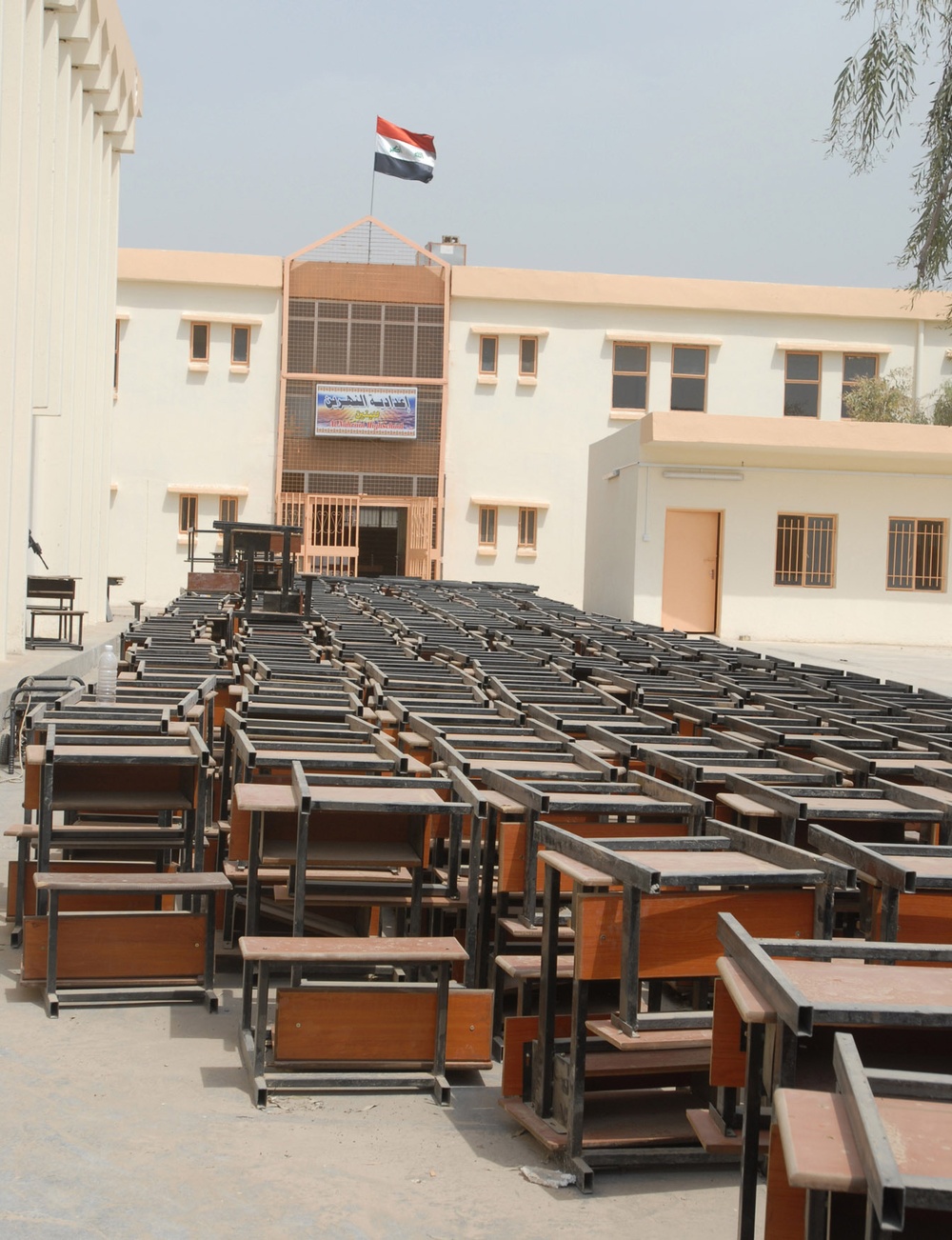 Schools refurbished in Abu T'shir - MND-B Soldiers, local leaders hold luncheon to signify completion