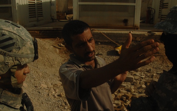 U.S. Soldiers Assess Water Purification Plant
