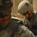 U.S. Soldiers Assess Iraqi Checkpoint