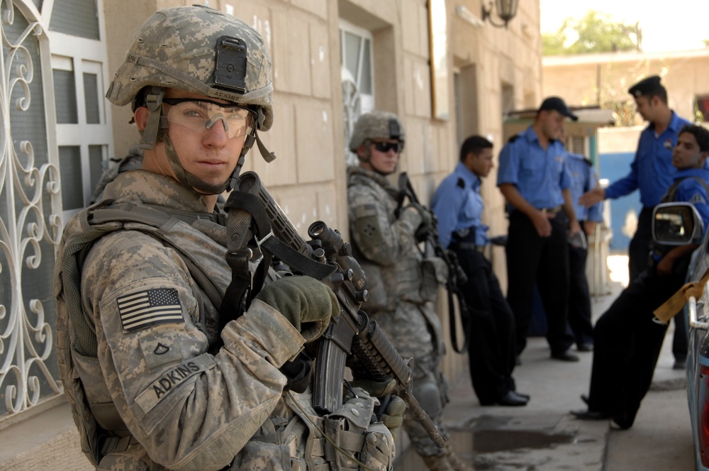 U.S. Soldiers train Iraqi police in Reaction to Contact