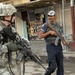 U.S, Iraqi soldiers Patrol Baghdad Neighborhood