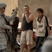 U.S, Iraqi soldiers Patrol Baghdad Neighborhood