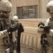 U.S, Iraqi soldiers Patrol Baghdad Neighborhood