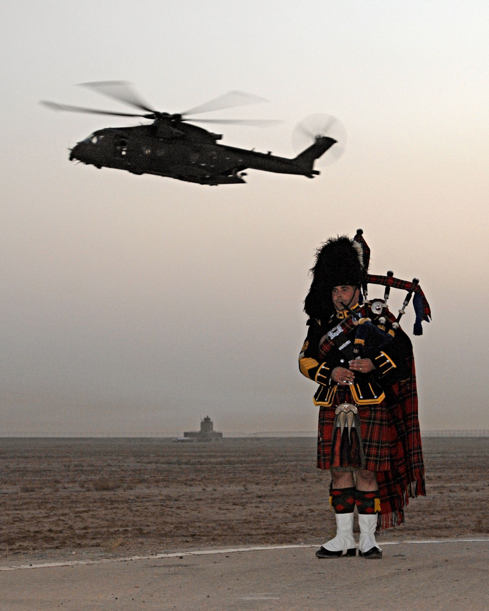 Royal Scots Dragoon Guards Piper Plays His Pipes