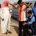 Iraqi Police Conduct Vehicle Search