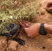 Marines plant mock IEDs for training