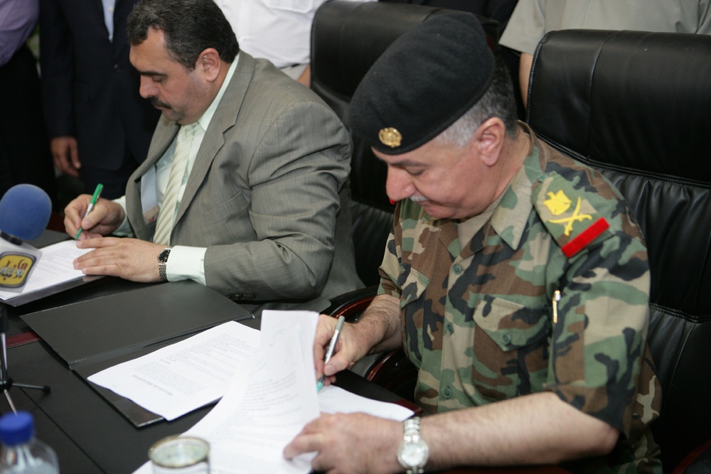 Historic day a signature of transition to peace, security in Anbar