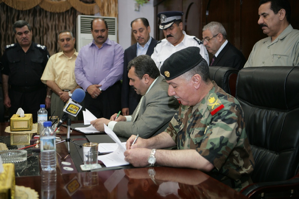 Historic day a signature of transition to peace, security in Anbar