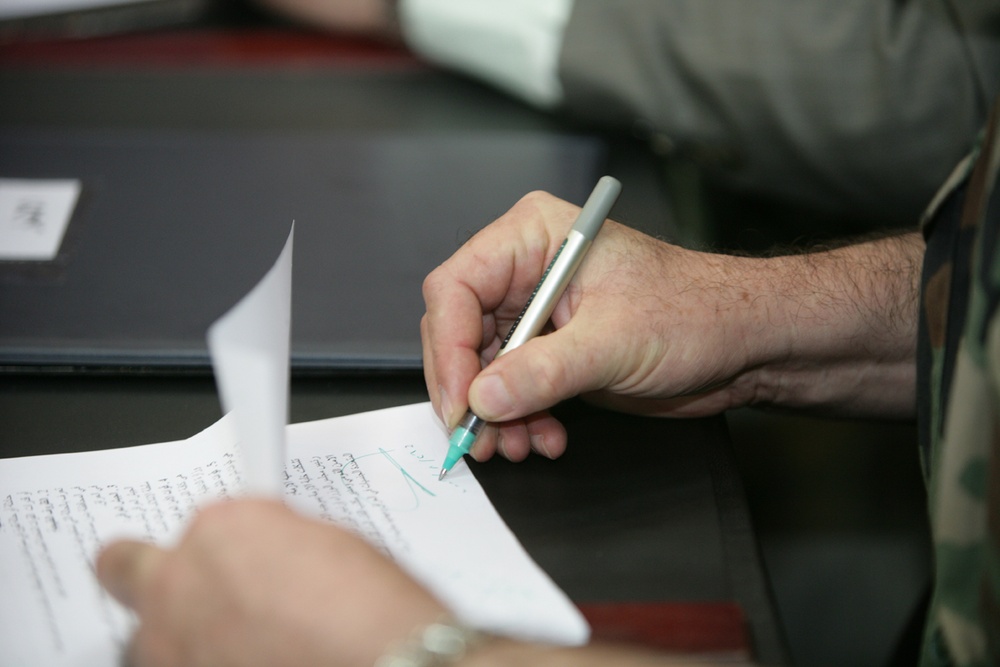 Historic day a signature of transition to peace, security in Anbar