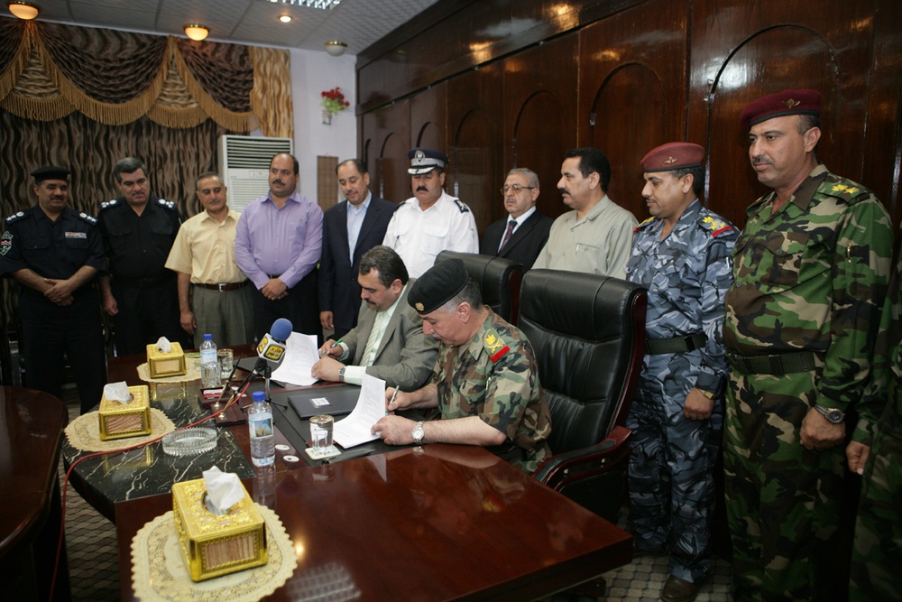 Historic day a signature of transition to peace, security in Anbar