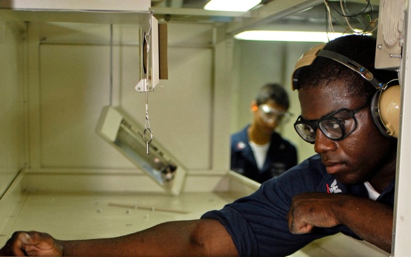 Seaman Aboard USS Blue Ridge Prep for Space Renovation