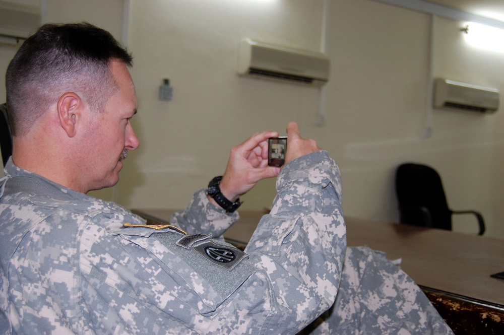 Deployed CAB pilot watches mother retire after 33 years of civil service