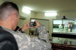 Deployed CAB pilot watches mother retire after 33 years of civil service