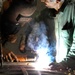 Iraqi welders work on project