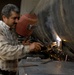 Iraqi welders work on project