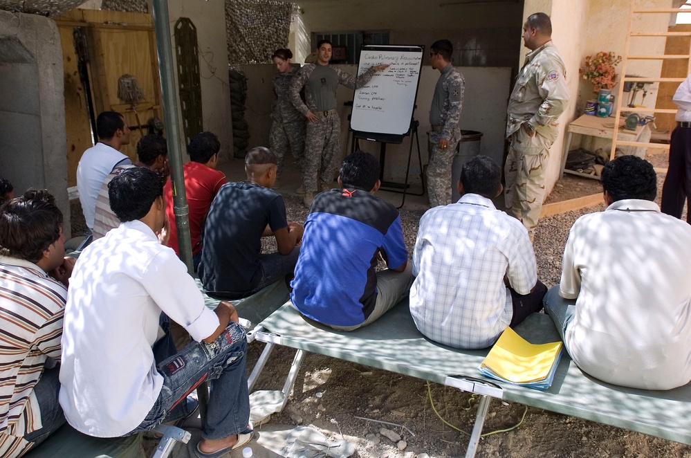 Regular Soldiers teach Iraqi lifeguards how to save a life