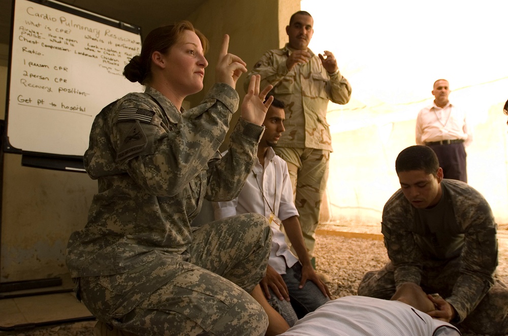 Regular Soldiers teach Iraqi lifeguards how to save a life