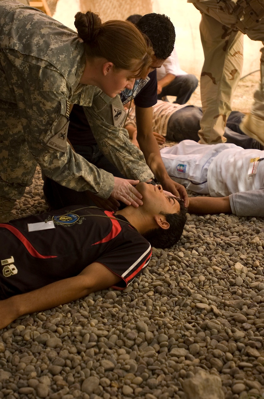 Regular Soldiers teach Iraqi lifeguards how to save a life