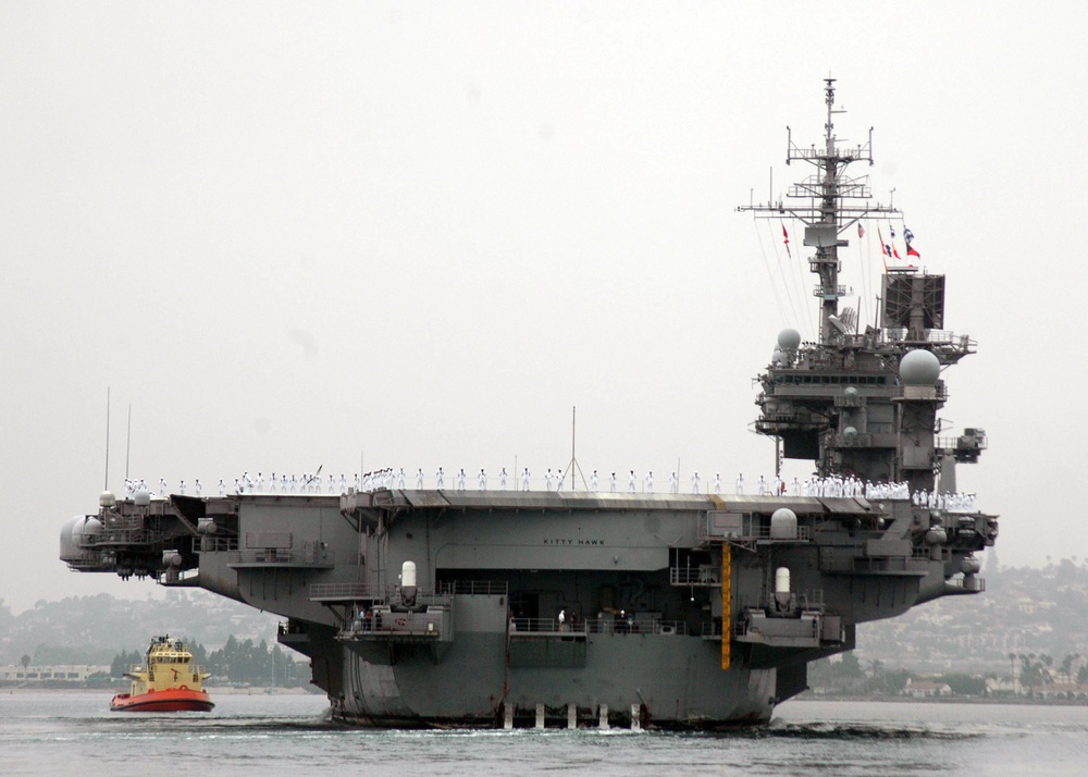 USS Kitty Hawk Leaves Pier for Final Time at Sea