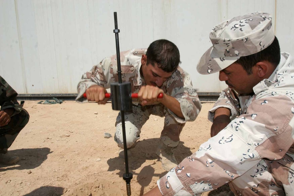 Laying the 'ground' work at Camp Mejid: 3rd MAW (Fwd.) Marines lead basic electrical skills course for Iraqi Army
