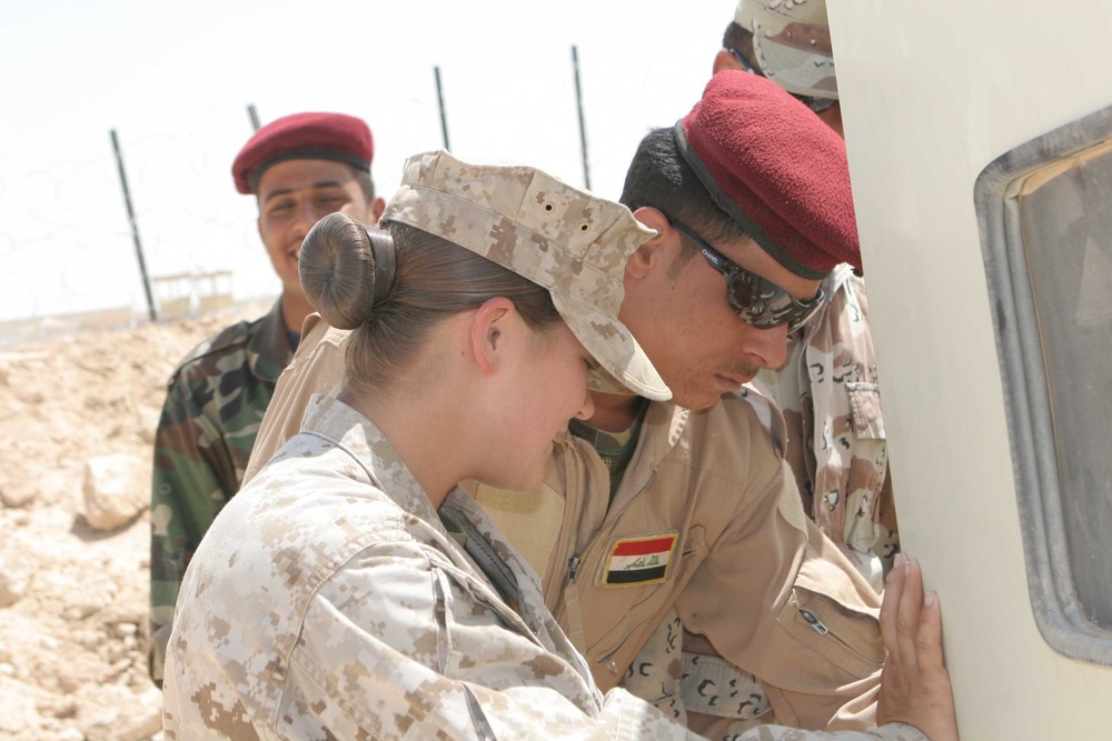 Laying the 'ground' work at Camp Mejid: 3rd MAW (Fwd.) Marines lead basic electrical skills course for Iraqi Army