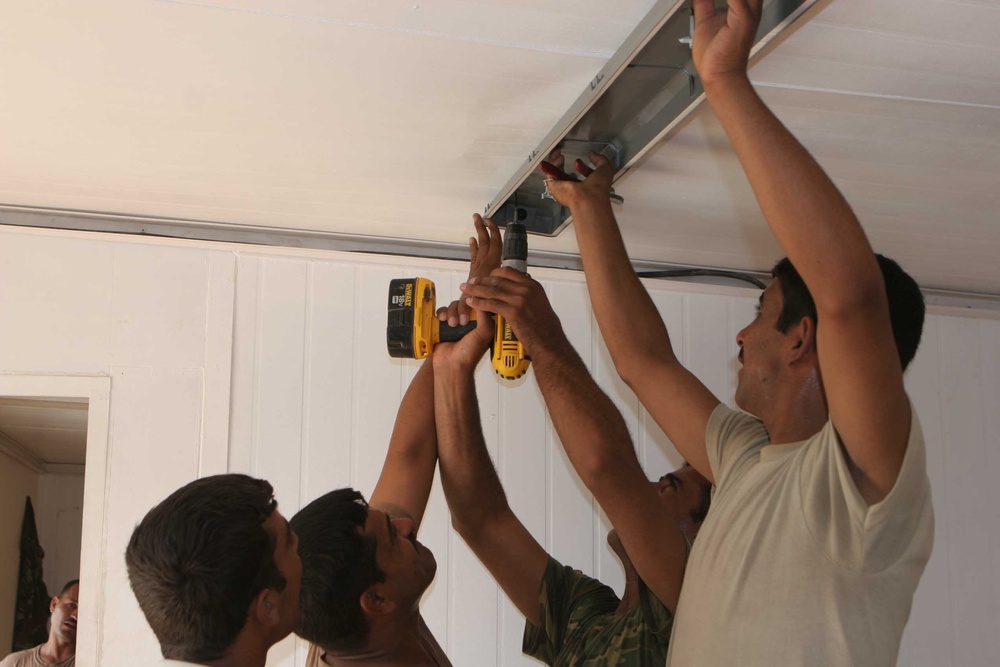 Laying the 'ground' work at Camp Mejid: 3rd MAW (Fwd.) Marines lead basic electrical skills course for Iraqi Army