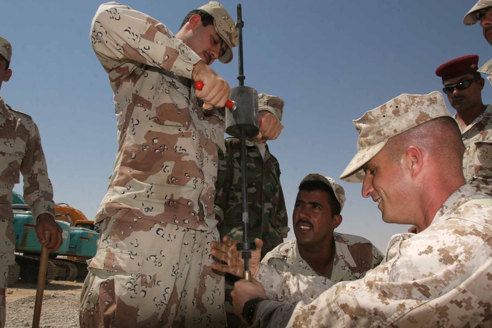 Laying the 'ground' work at Camp Mejid: 3rd MAW (Fwd.) Marines lead basic electrical skills course for Iraqi Army