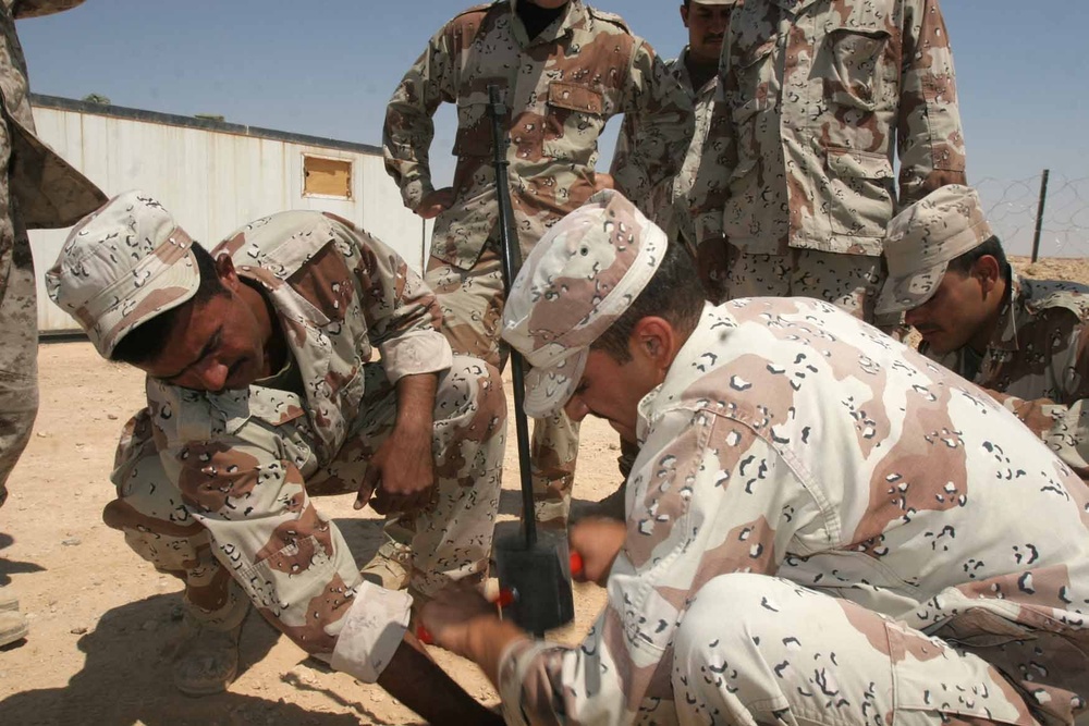 Laying the 'ground' work at Camp Mejid: 3rd MAW (Fwd.) Marines lead basic electrical skills course for Iraqi Army