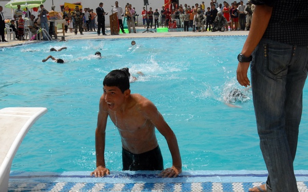 Iraqis take lead in Mithaq Pool opening