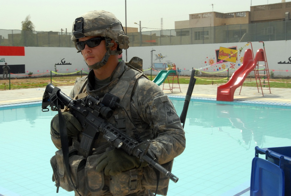 MND-B Soldiers provide security at Mithaq Pool opening