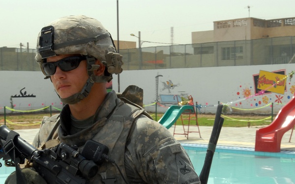 MND-B Soldiers provide security at Mithaq Pool opening