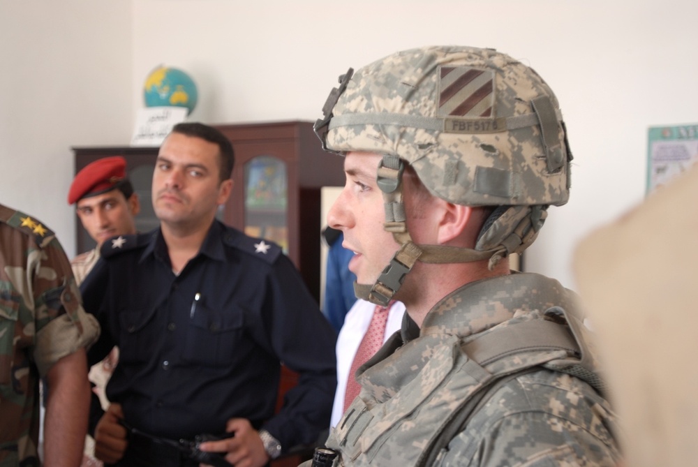 Iraqis, Coalition forces open new school in Baghdad Province