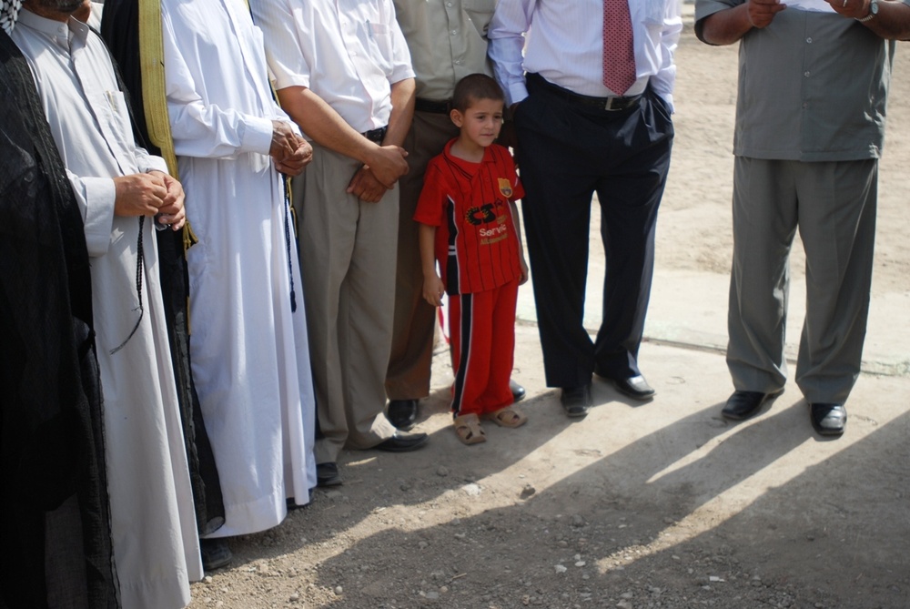 Iraqis, Coalition forces open new school in Baghdad Province