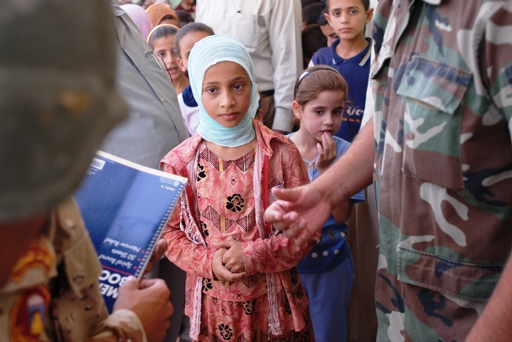Iraqis, Coalition forces open new school in Baghdad Province
