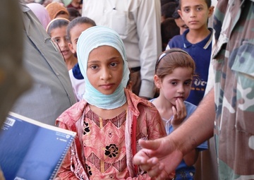 Iraqis, Coalition forces open new school in Baghdad Province
