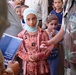 Iraqis, Coalition forces open new school in Baghdad Province