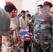 Iraqis, Coalition forces open new school in Baghdad Province