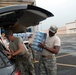 Louisiana National Guardsmen distribute food and water to residents in New Iberia, La.
