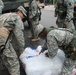 Members of the Louisiana National Guard's 256th Brigade Combat Team Distribute Supplies