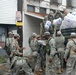 Members of the Louisiana National Guard's 256th Brigade Combat Team Distribute Supplies