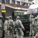 Members of the Louisiana National Guard's 256th Brigade Combat Team Distribute Supplies