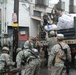 Members of the Louisiana National Guards 256th Brigade Combat Team Distribute Supplies