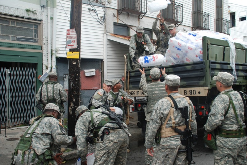 Members of the Louisiana National Guards 256th Brigade Combat Team Distribute Supplies