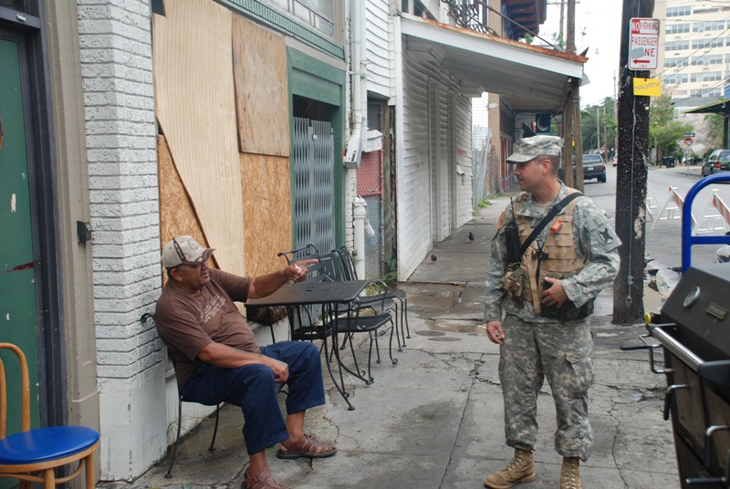 Members of the Louisiana National Guard's 256th Brigade Combat Team Distribute Supplies