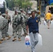 Members of the Louisiana National Guard's 256th Brigade Combat Team Distribute Supplies